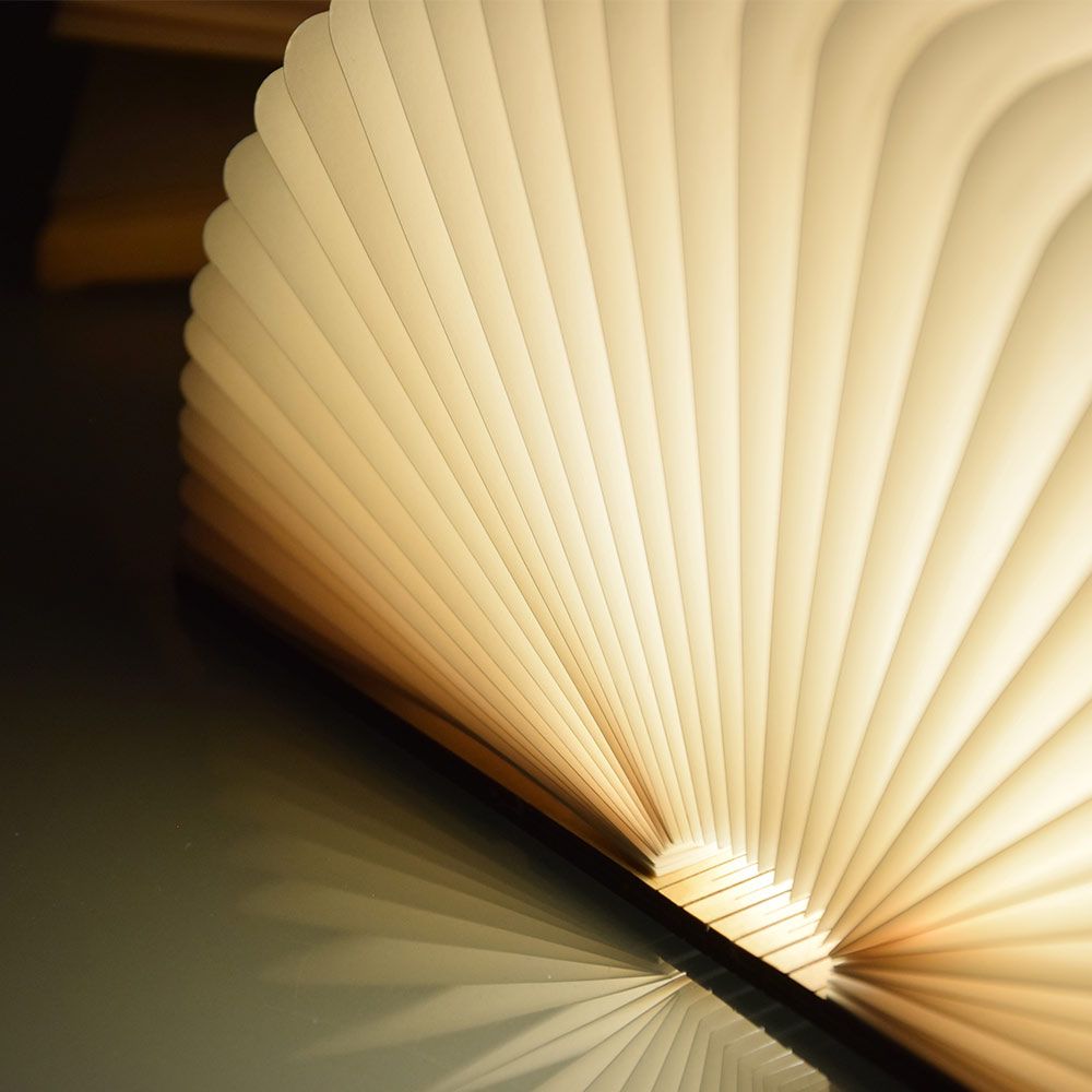 osvetljena knjižna zložljiva svetilka